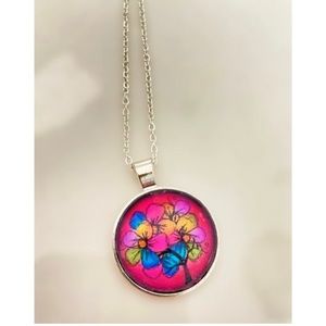 Adorable handmade pendant with bright flowers and colors